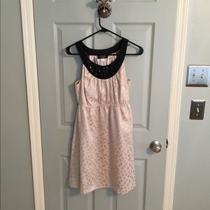 Sleeveless, jeweled neck dress